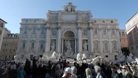 Photo for Italy 2023 - The Trevi Fountain in Rome downtown - It is the largest Baroque fountain in Rome and one of the most famous fountains in the world - touristic attraction and sightseeing - Royalty Free Image