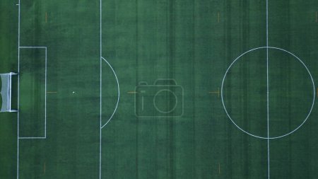 Photo for Without players during Covid-19 Coronavirus outbreak lockdown - sport activities - midfield circle, kick-off of the match - Royalty Free Image