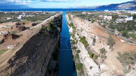 Corinth Canal Connecting The Gulf Of Corinth With Saronic Gulf In Aegean Sea, Greece - aerial drone shot