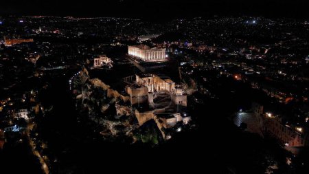 Photo for Aerial view of Acropolis in Greece by night , Parthenon in Athens, sigthseeing destination Unesco World Heritage in Atene. - Royalty Free Image