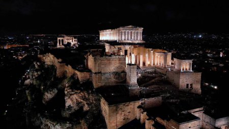 Photo for Aerial view of Acropolis in Greece by night , Parthenon in Athens, sigthseeing destination Unesco World Heritage in Atene. - Royalty Free Image
