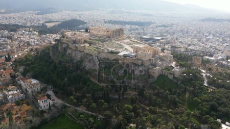 Acropolis in Greece, Parthenon in Athens drone aerial view, famous Greek tourist attraction, Ancient Greece landmark drone aerial view - sightseeing
