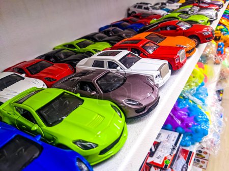 Photo for Colorful toy cars inside a store - Royalty Free Image