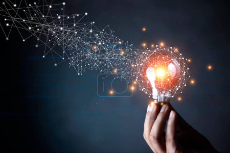 Foto de Businessman Touching Icon Bulb.Concept of Ideas for success.Concept with innovation inspiration.Success start from new ideas to innovative technology relying on information from the internet big data - Imagen libre de derechos