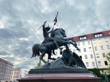 Berlin, Germany - 19 august 2020 : statue of St. George and the Dragon, on the horse