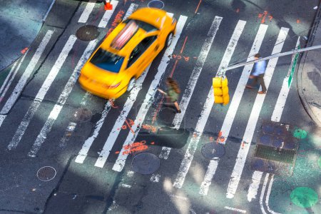 Photo for Aerial view of yellow taxi & pedestrian crossing, Central Manhattan, New York, USA - Royalty Free Image