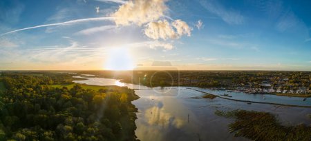 An aerial view at sunset over the River Deben at Melton in Suffolk, UK
