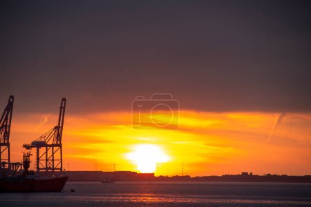Photo for Sunrise over the Port of Felixstowe in Suffolk, UK - Royalty Free Image