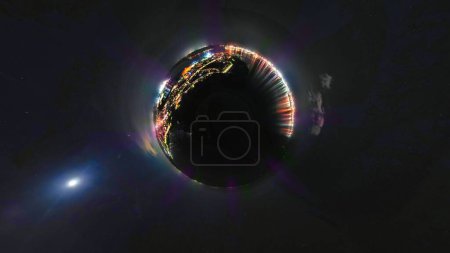 Photo for A tiny planet view of the ports of Harwich and Felixstowe at night in the UK - Royalty Free Image