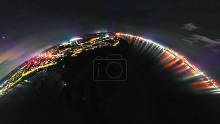 Photo for A panoramic view of the ports of Harwich and Felixstowe at night in the UK - Royalty Free Image