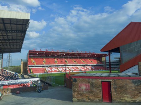 Photo for Blue skies over the Oakwell Stadium, home of Barnsley Football Club in Yorkshire, UK - Royalty Free Image