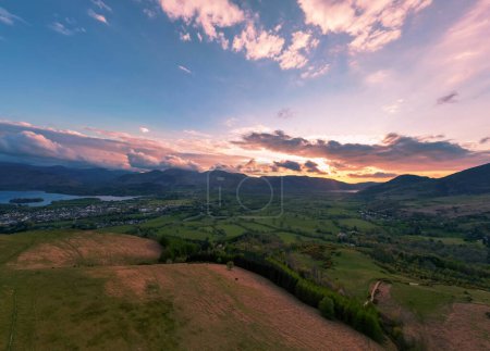 Photo for Sunrise behind the hills overlooking Keswick in Cumbria, UK - Royalty Free Image