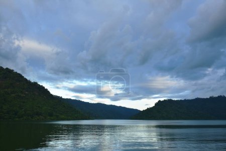 Photo for Landscape of water reservoir lake with mountain background in sunset - Royalty Free Image