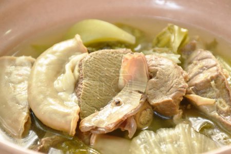 Photo for Pickled Chinese cabbage with pork entrails and bone soup in bowl - Royalty Free Image