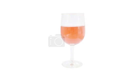 pink sparkling wine with frothy in drinking glass on white background