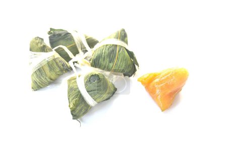 sweet Zongz sticky rice steam with alkaline water wrapped in banana leaf on white background