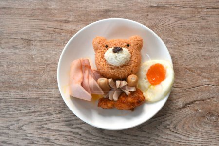 American fried rice Thai applied food decorating cute bear on plate