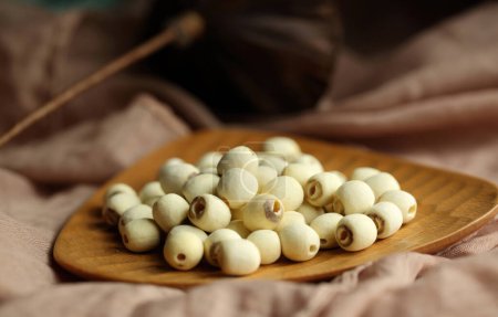 Foto de Imágenes de semillas de loto con fotos de alta resolución, ricas en nutrientes, bajas en calorías y propiedades ricas en antioxidantes - Imagen libre de derechos