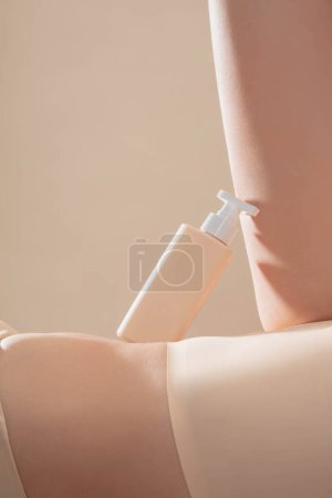 Photo for Beautiful young woman with cosmetic jar and testing cosmetics on her skin - Royalty Free Image