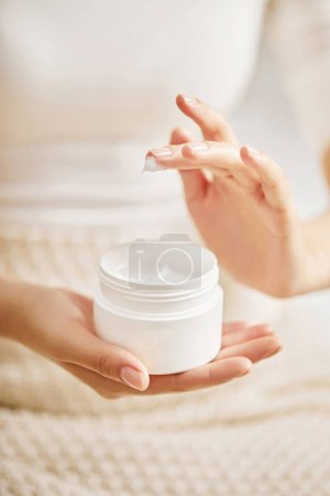 Beautiful Woman Hands, female Hands Applying Cream, Lotion, Spa and Manicure concept, Female hands with french manicure,