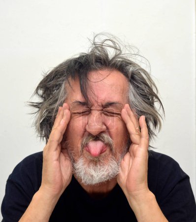 Foto de Retratos de un anciano en varias etapas emocionales - Imagen libre de derechos