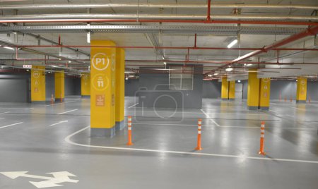 Photo for Traffic signals for pedestrians in the underground garage of the shopping center in the city - Royalty Free Image