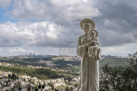 Photo for Abu Ghosh, Israel - March 7th, 2024: The statue of the Lady of La Vang, in the Garden of the church of Our Lady of the Ark of the Covenant in Abu Ghosh, Israel, overlooking Abu Ghosh and Jerusalem. - Royalty Free Image