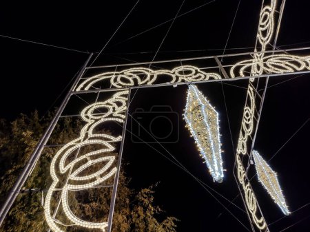 Photo for Christmas decorations made of lights on the streets of Baia Mare city, Romania - Royalty Free Image