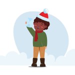 Happy black boy wearing a Santa Claus cap and red scarf, holding up an envelope for Santa Clau