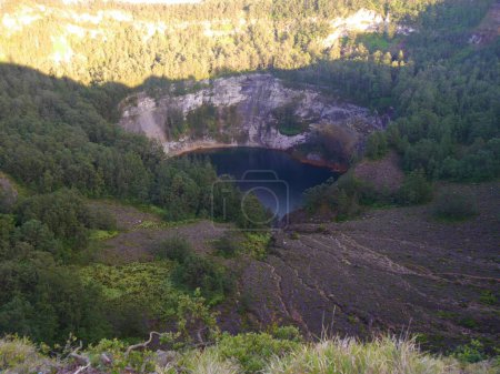 View of one of Kelimutu tri-coloured crater lakes, Flores, Indonesia. High quality photo