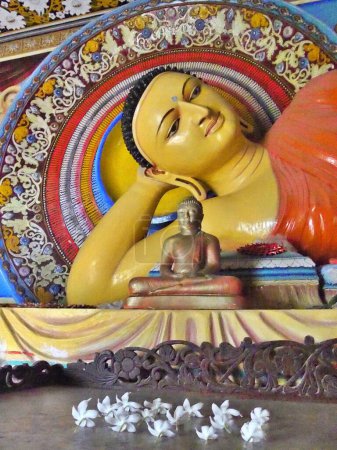 Close up of reclining Buddha, Dhowa Rock Temple, Ella, Sri Lanka. High quality photo