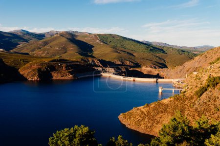 Photo for Beautiful Aerial View of El Atazar Dam in the Mountain Range of Madrid at sunset - Royalty Free Image