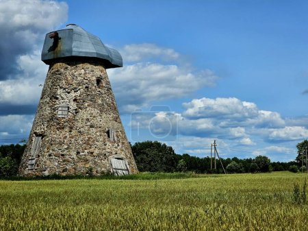 Large antique windmill and meadow