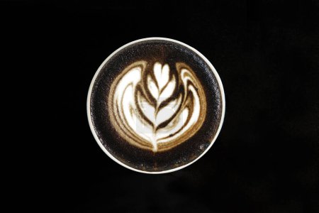 Photo for A cup of latte art coffee on black background - Royalty Free Image