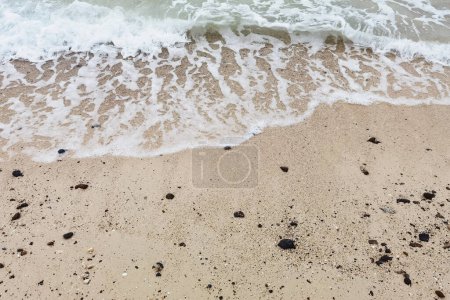 Photo for Wave of the sea on the sand beach - Royalty Free Image