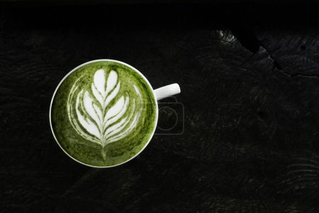 Photo for A cup of green tea matcha latte for background - Royalty Free Image