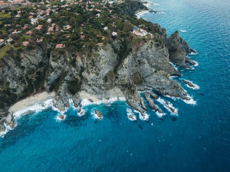 Stormy ocean and Riaci Bay aerial view in Calabria