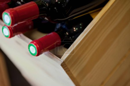 Caps of red wine bottles