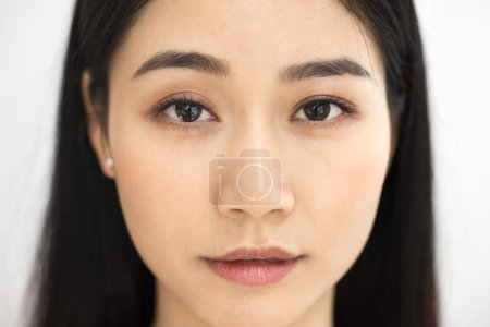 Photo for Beautiful female Asian beauty care models face front close up. Calm relaxed young Korean woman with soft clean perfect skin looking at camera, posing for cropped portrait - Royalty Free Image