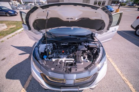 Foto de Car engine inspection before purchase. Pre purchase or pre delivery engine compartment check. Service in garage or shop. Certification of used car or vehicle for sale, trade in or financing. - Imagen libre de derechos