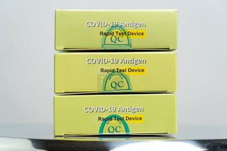 Photo for Toronto, Ontario, Canada - December 30, 2022: Rapid Response Covid 19 Antigen rapid test device. For the direct and qualitative detection of SARS-Cov-2 viral nucleoprotein antigens. - Royalty Free Image