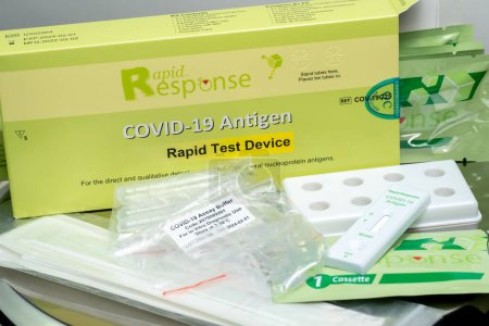 Photo for Toronto, Ontario, Canada - December 26, 2022: Rapid Response Covid 19 Antigen rapid test device. For the direct and qualitative detection of SARS-Cov-2 viral nucleoprotein antigens. - Royalty Free Image
