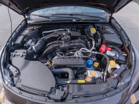 Téléchargez les photos : Car engine inspection before purchase. Pre purchase or pre delivery engine compartment check. Service in garage or shop. Certification of used car or vehicle for sale, trade in or financing. - en image libre de droit