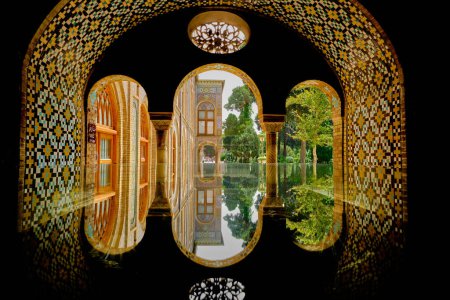 Tehran (Teheran), Iran, 06.24.2023: Arch view of Golestan Palace, iran. Reflection of palace over the mirror.