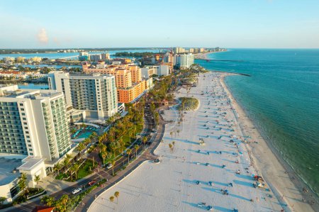 Photo for Florida. Panorama of Clearwater Beach FL. Summer vacations in Florida. Beautiful View on Hotels and Resorts on Island. Sunset time. Ocean water. American Coast. Shore Gulf of Mexico. Aerial view - Royalty Free Image