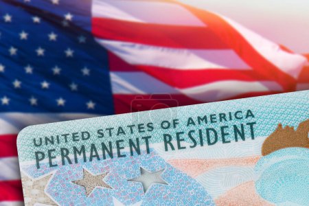 Green Card US Permanent resident card. Immigrant ID documents. USA Electronic Diversity Visa Lottery DV-2024 DV Lottery Results. United States of America. American flag on background