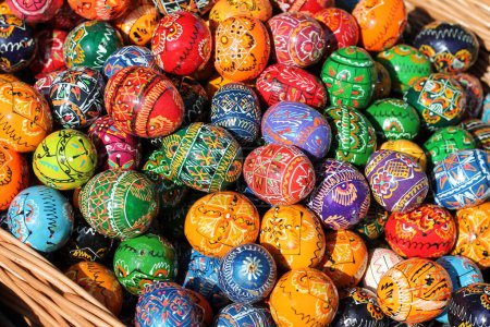 Photo for Traditional Czech easter eggs for sale at a market. Hand painted Easter eggs at a basket. - Royalty Free Image