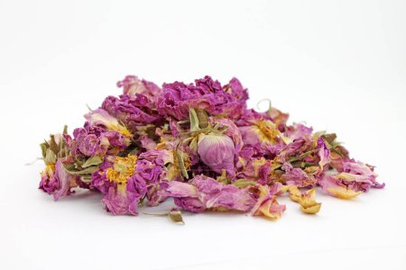 Photo for Studio shot of dry rose petals tea on white background. Selektive focus. - Royalty Free Image
