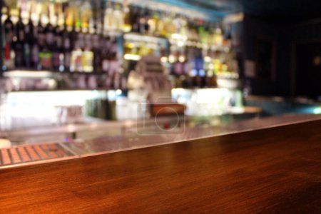 Photo for Interior of bar. Classic defocused bar counter background close-up. - Royalty Free Image