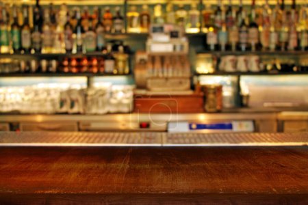 Photo for Interior of bar. Classic defocused bar counter background close-up. - Royalty Free Image